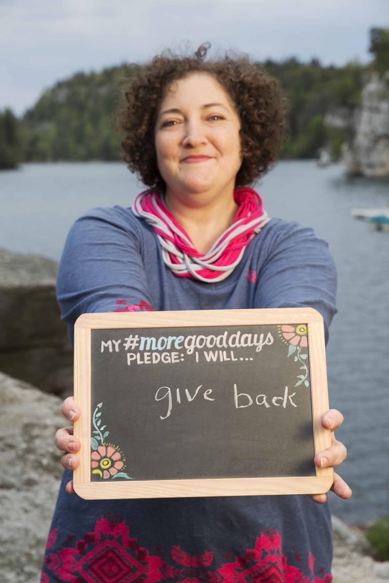 Rebecca Weiss Holding Chalkboard Ford Warriors In Pink