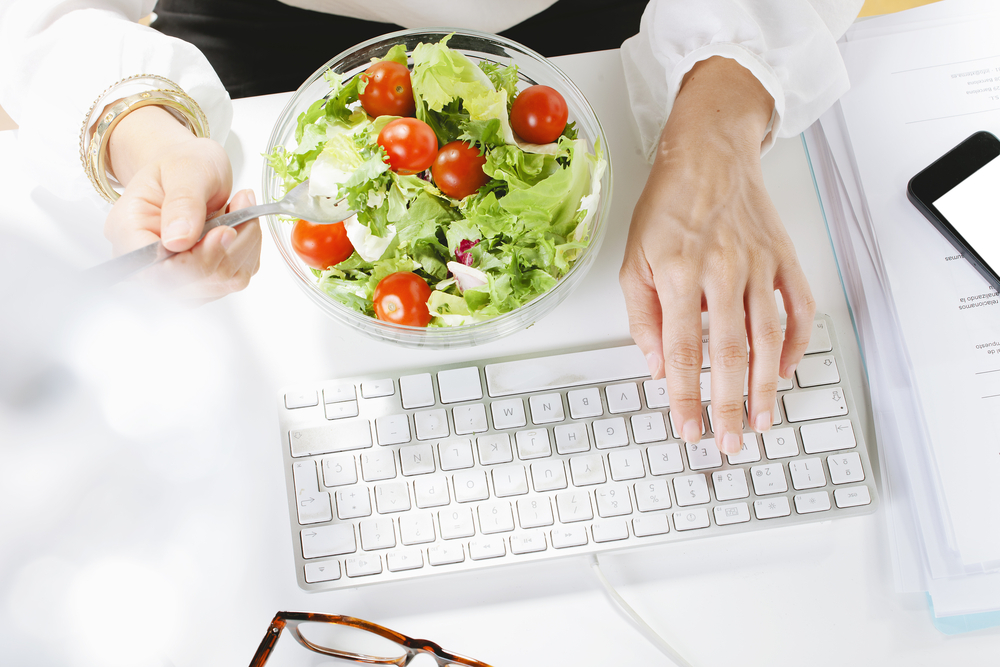 eating salad while working