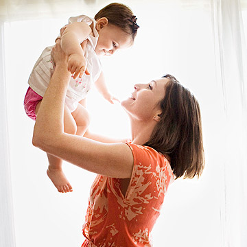 woman holding baby