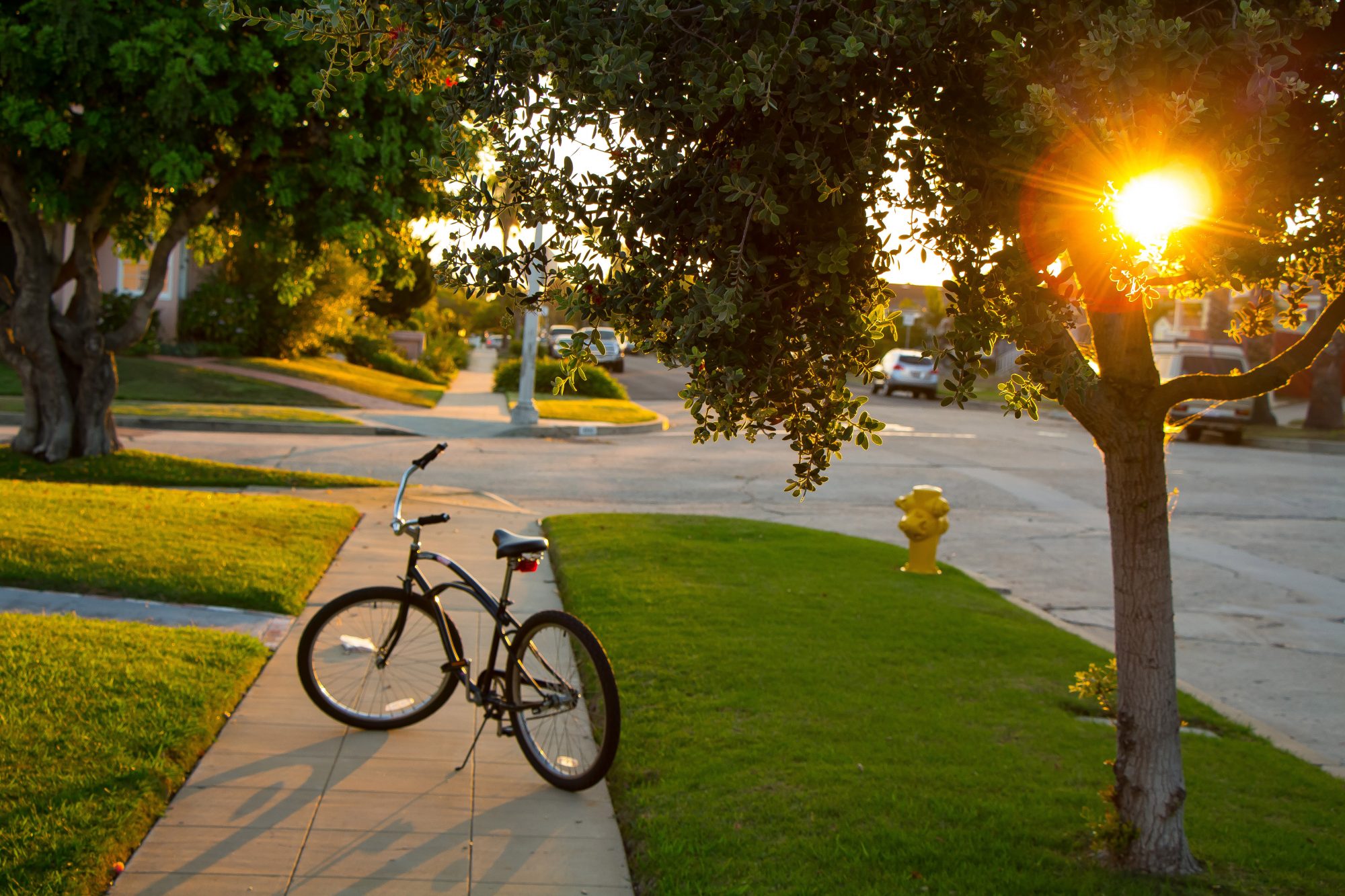 An image of a bike in front of a house.