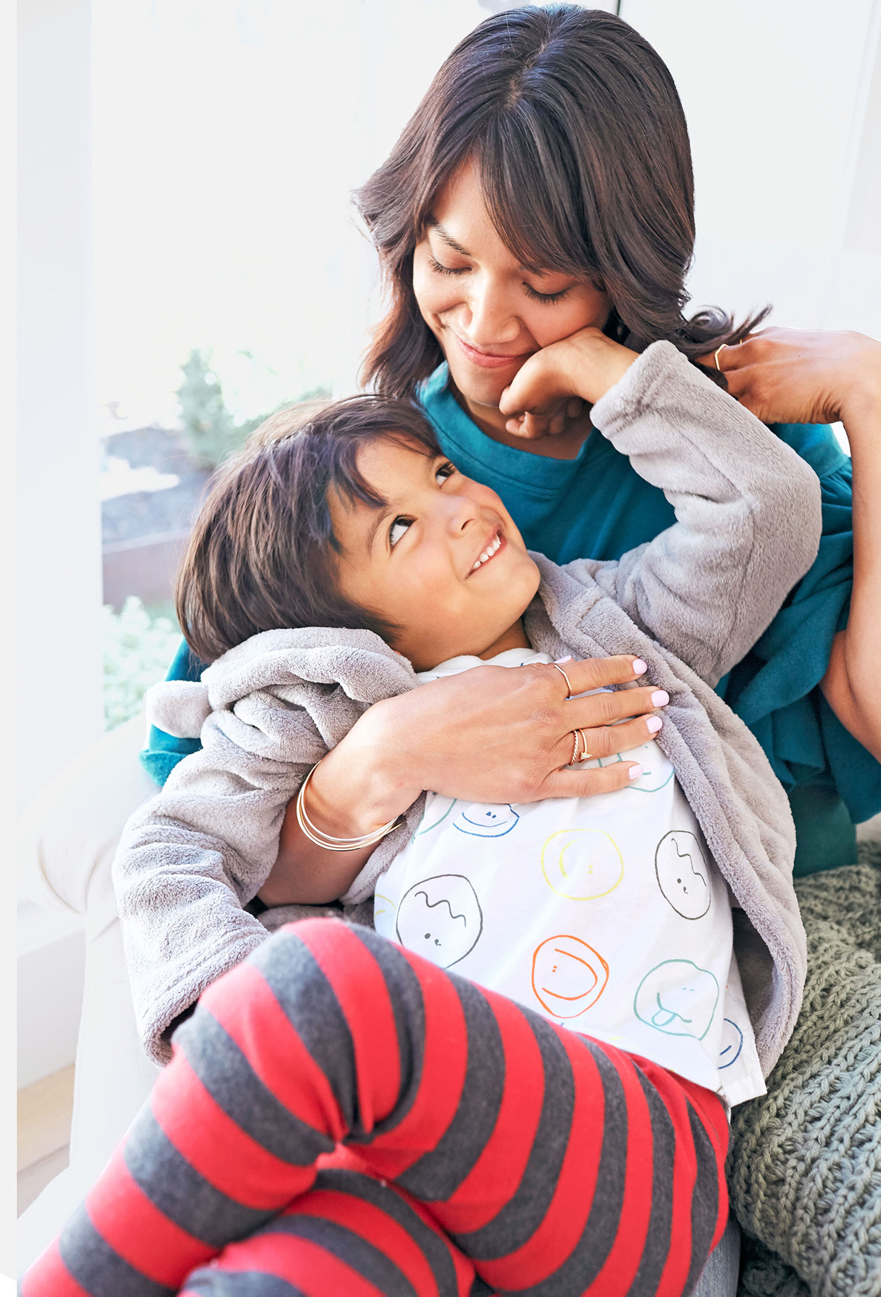 child sitting with parent