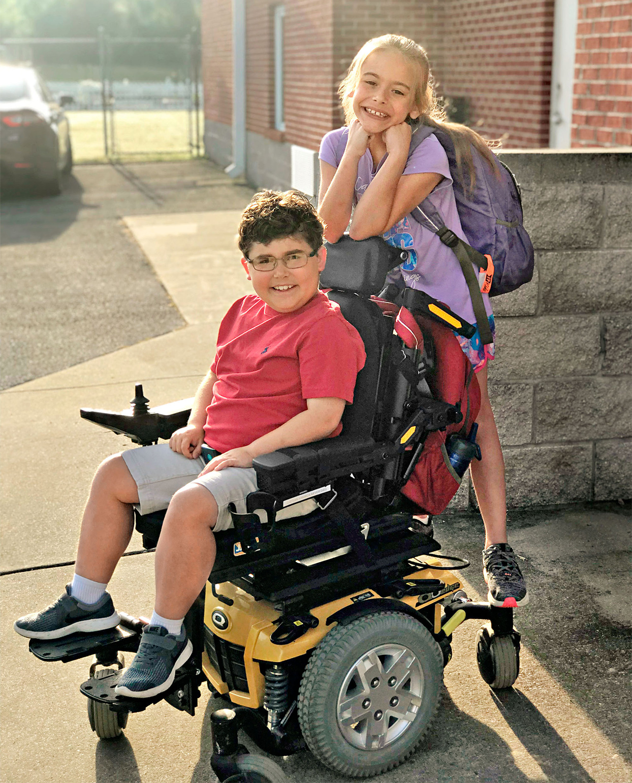 ethan lybrand in wheelchair with sister