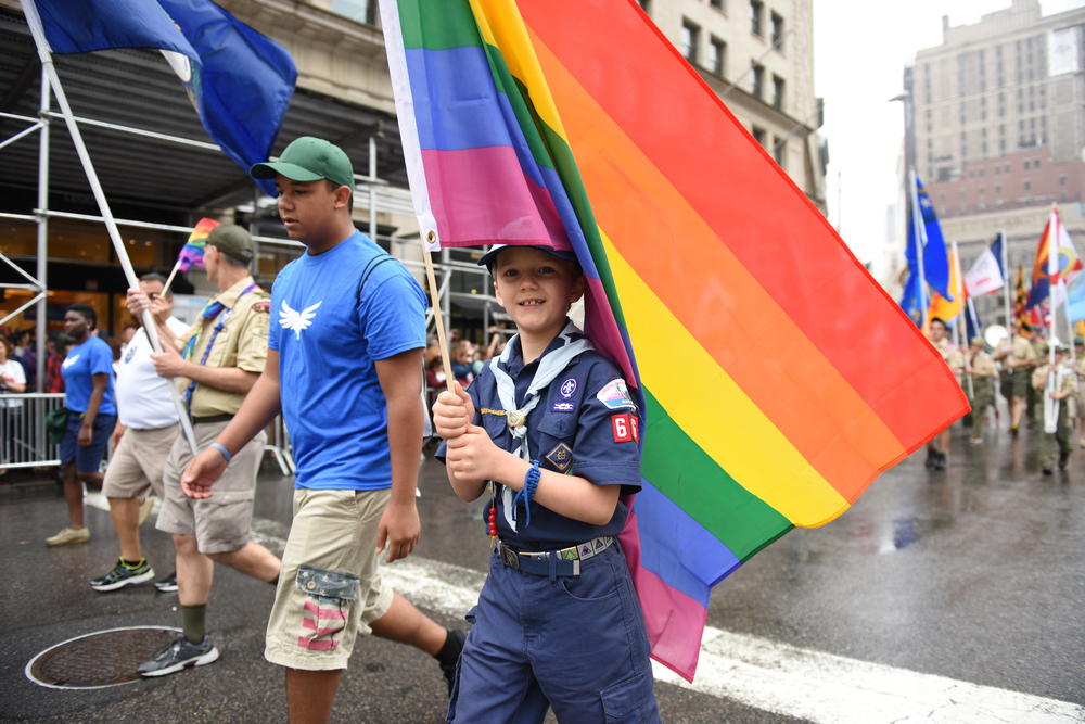 boy scout marching for LGBT