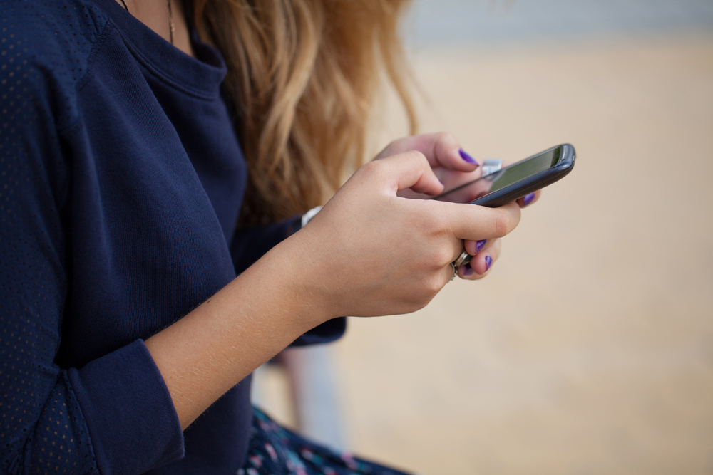 teen girl on cell phone, social media