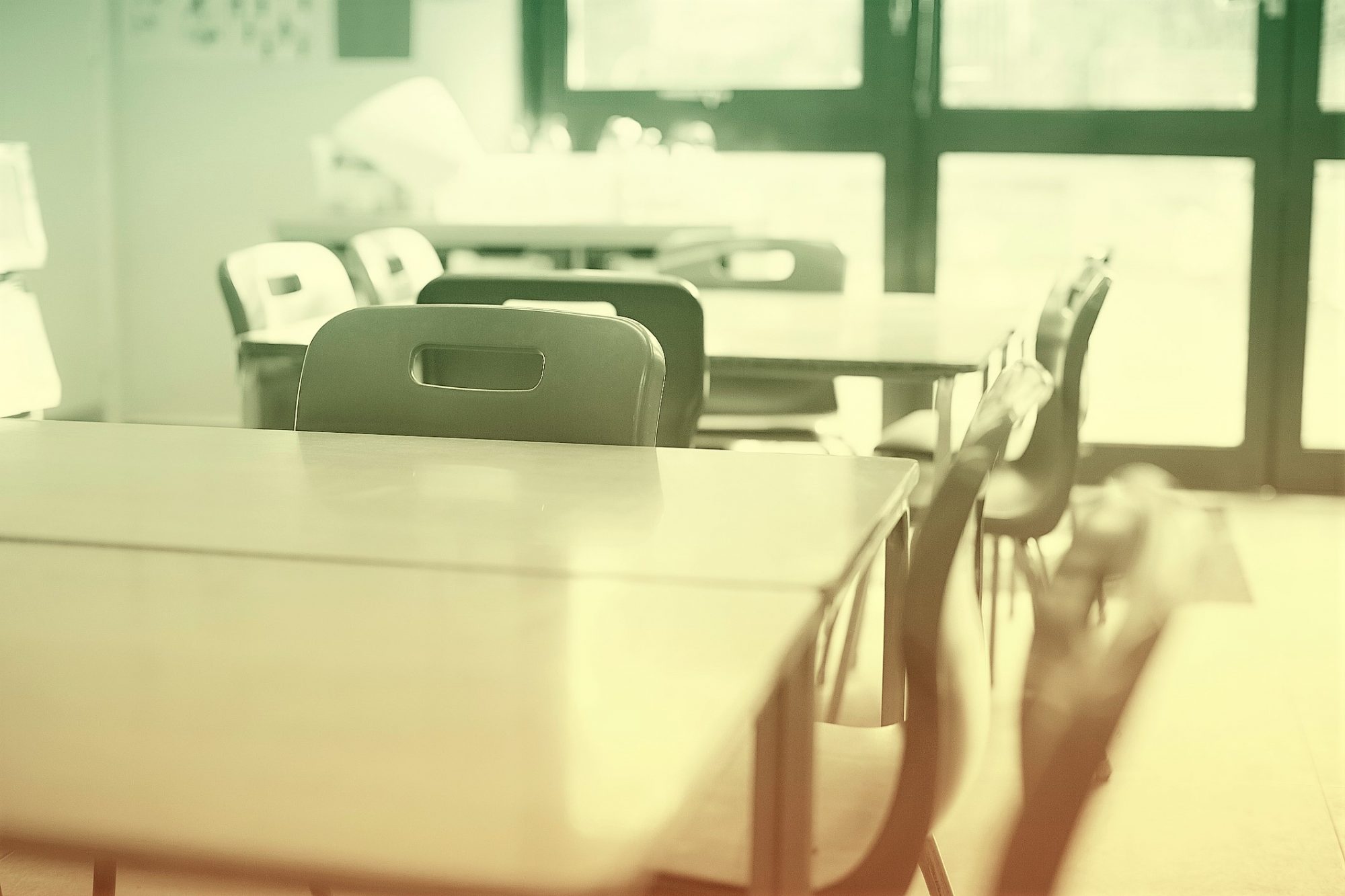 desks and chairs in classroom