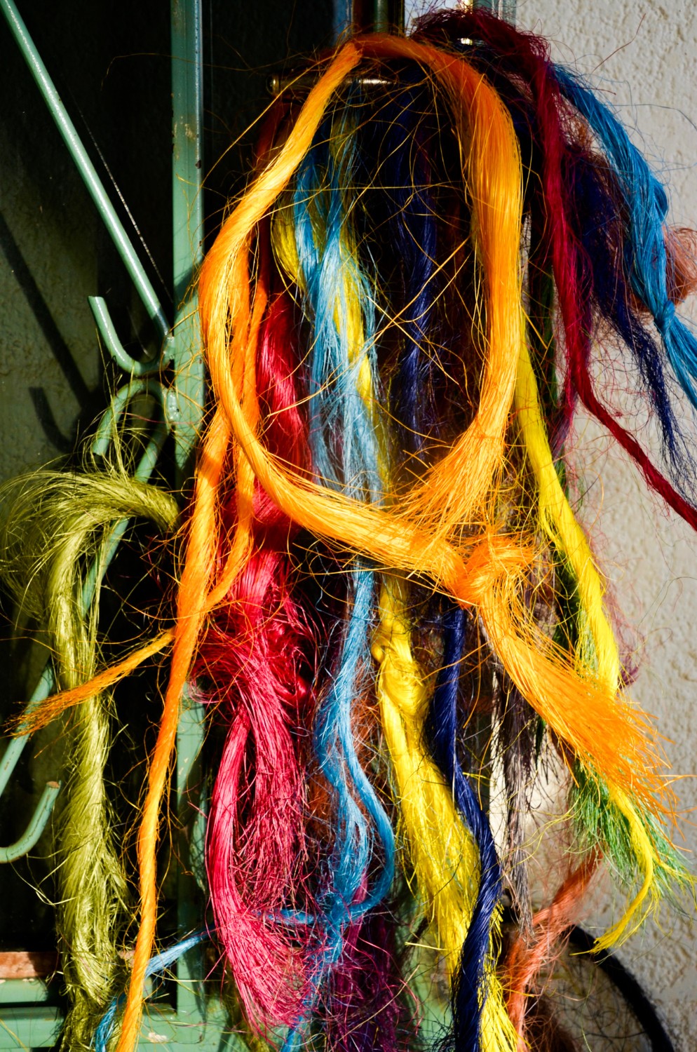 Variety of colors of sisal fibers that are used for peace baskets from Rwanda